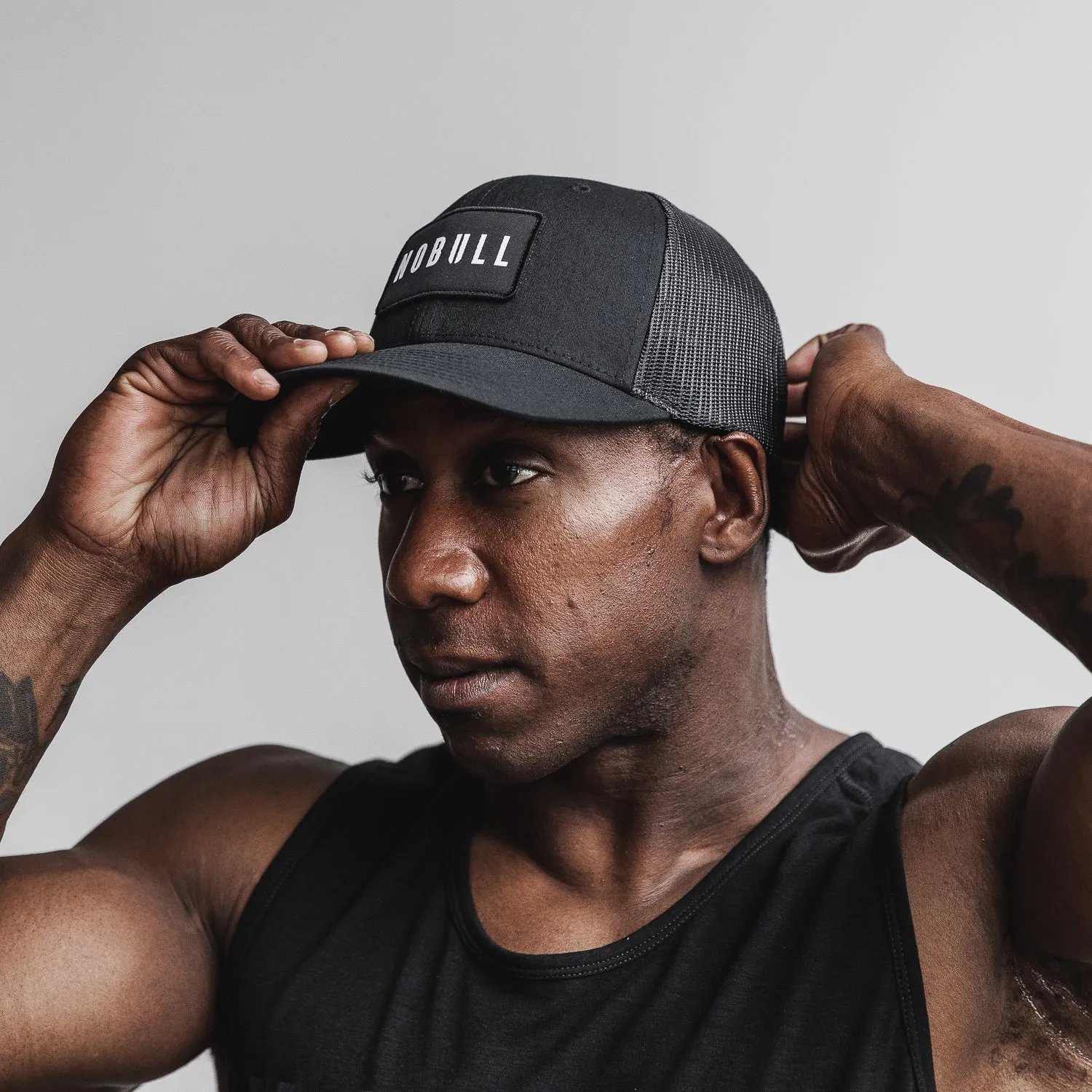 NOBULL Curved Brim Trucker